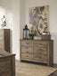 Trinell - Brown Dark - Six Drawer Dresser - 61.34" x 15.98" x 42.99"