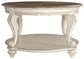 Realyn - White / Brown - Oval Cocktail Table