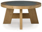 Brinstead - Light Brown - Oval Cocktail Table