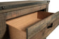 Trinell - Brown - Five Drawer Chest