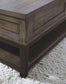 Johurst - Grayish Brown - Lift Top Cocktail Table