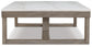 Loyaska - Brown/ivory - Rectangular Cocktail Table